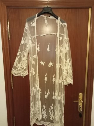 Blusa de encaje transparente bordada
