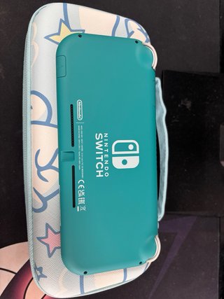 Nintendo Switch Lite Verde + 2 Juegos Negociable