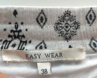 Minifalda blanca estampado tribal negro