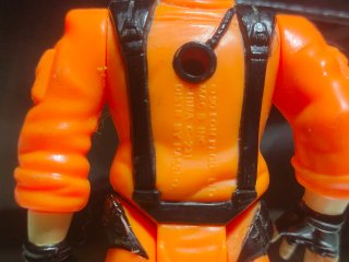 Figura James Bond Naranja