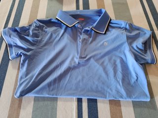 Maglietta polo azzurra tecnica COOP