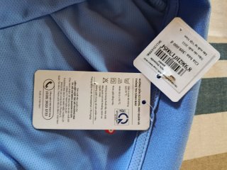 Maglietta polo azzurra tecnica COOP