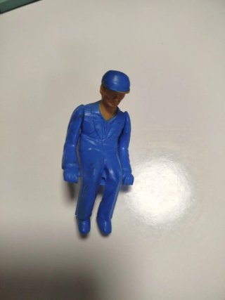 Muñeco conductor azul antiguo