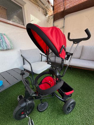 Triciclo evolutivo rojo con capota