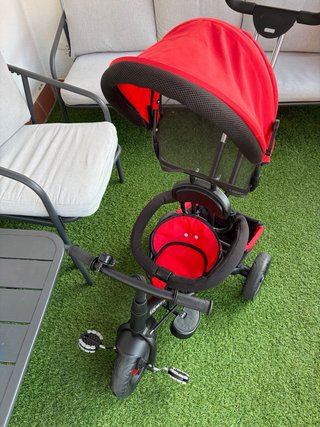 Triciclo evolutivo rojo con capota