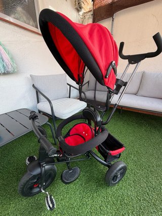 Triciclo evolutivo rojo con capota