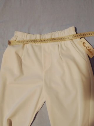 Pantaloni bianchi con risvolto