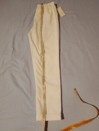 Pantaloni bianchi con risvolto