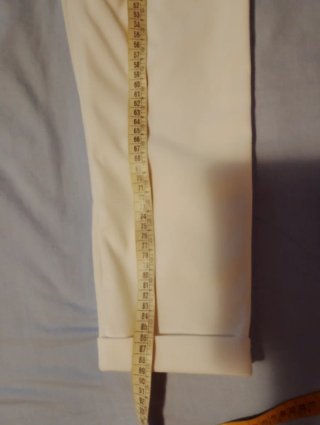Pantaloni bianchi con risvolto