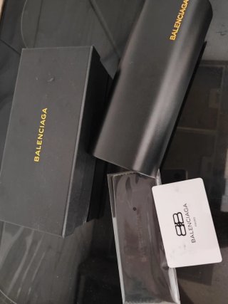Occhiali da sole Balenciaga unisex neri e oro