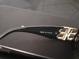Occhiali da sole Balenciaga unisex neri e oro