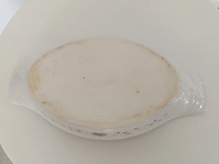 Bol de porcelana con flores azules antiguo