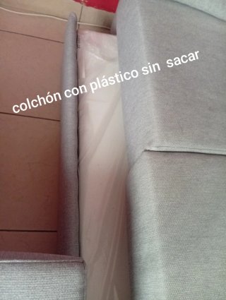 Sofá-cama gris + reposapiés