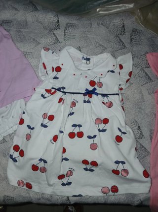 Tuta neonata rosa con cappuccio e orecchie
