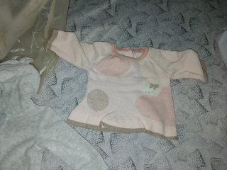 Tuta neonata rosa con cappuccio e orecchie