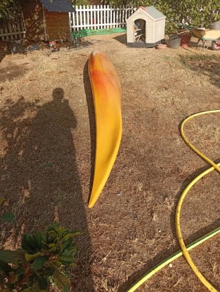 Kayak de travesía amarillo