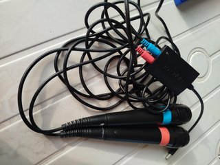 2 juegos Singstar PS2 + 2 micros