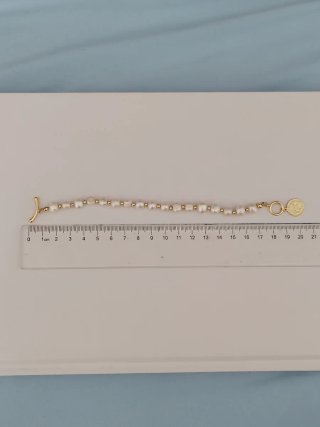 Pulsera perlas y relleno de oro