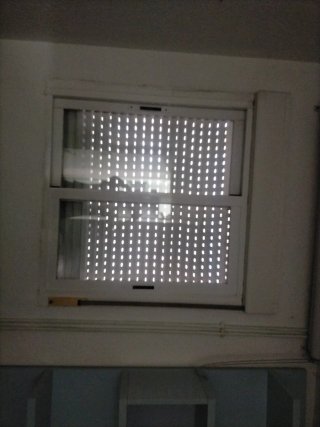 Ventana corredera con persiana