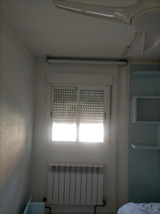 Ventana corredera con persiana