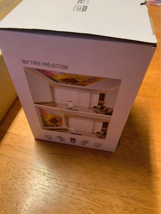 Proyector gris en caja