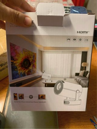 Proyector gris en caja