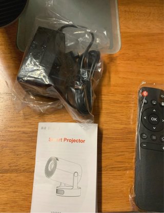 Proyector gris en caja