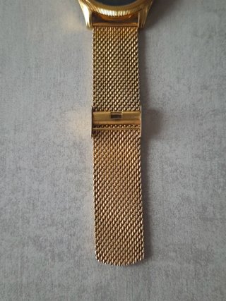 Reloj Guess Dorado y Negro Malla Metálica
