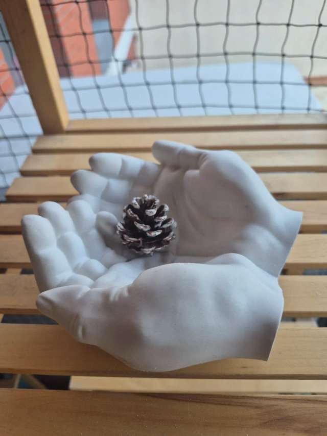 Decoración Mano Piedra