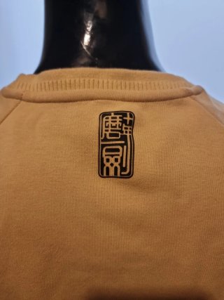 Jersey Adidas ocre con estampado