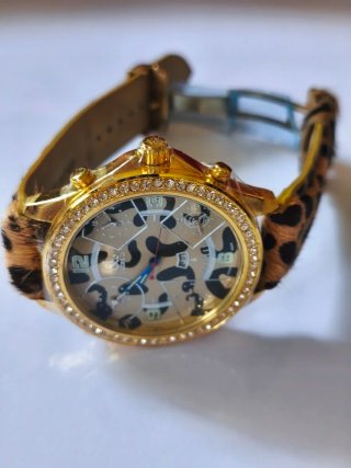 Reloj Jacob 5 usos horarios chapado en oro
