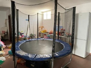 Cama elástica con red de seguridad