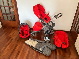 Cochecito Stokke + capazo + silla y accesorios