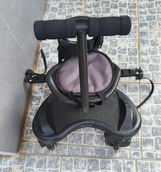 Silla adaptable a cochecito