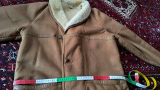 Montone shearling uomo taglia 50