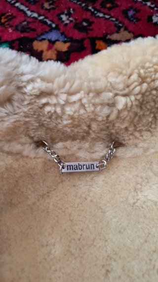 Montone shearling uomo taglia 50