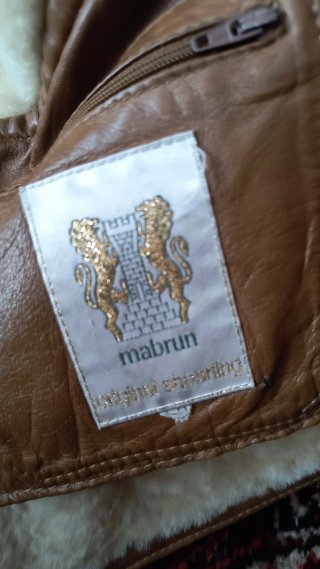 Montone shearling uomo taglia 50