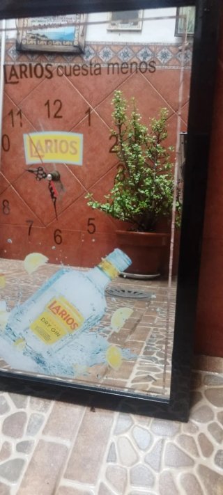 Cuadro decorativo con reloj Larios