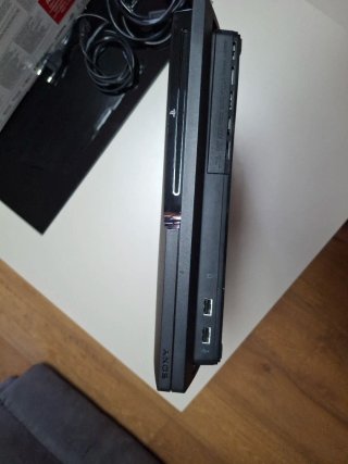 PS3 Slim 160GB + Caja + Move + cámara + juegos