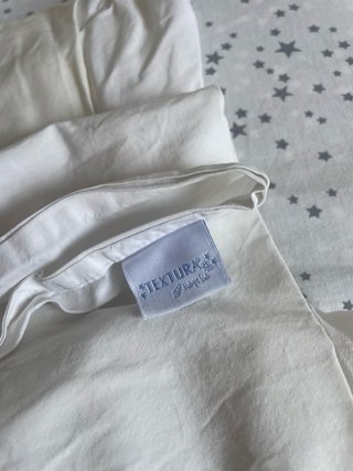 Conjunto Blanco sábanas y protector cuna Textura