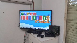 Tv 39"+ consola retro de regalo ascao