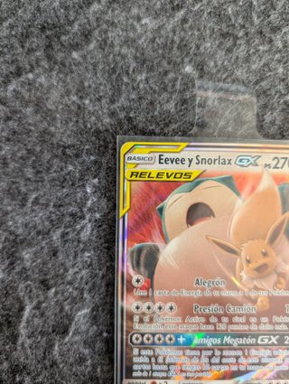 Carta Pokémon Eevee y Snorlax GX RELEVOS