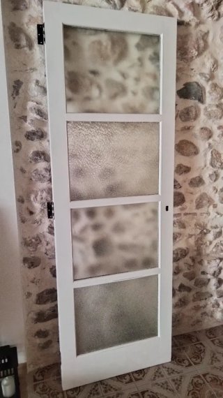 Puerta madera maciza con cristales