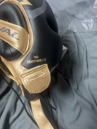 Casco Rival Profesional RHG100 Negro/Dorado NUEVO.