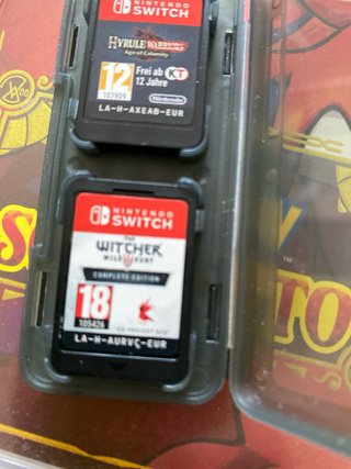 Nintendo Switch Lite Grigio + Custodia