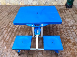 Mesa de camping plegable azul