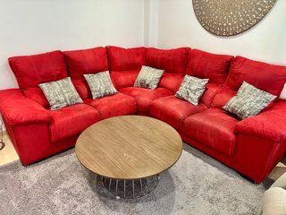 Sofá rinconera rojo de tela
