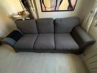 Sofá gris de tela