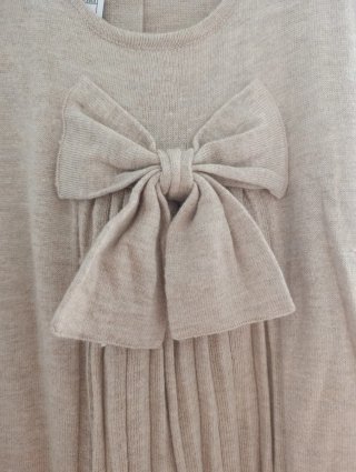 Vestido punto beige sin mangas lazo