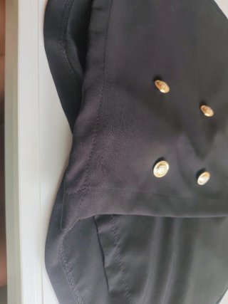 Falda pantalón negra botones dorados